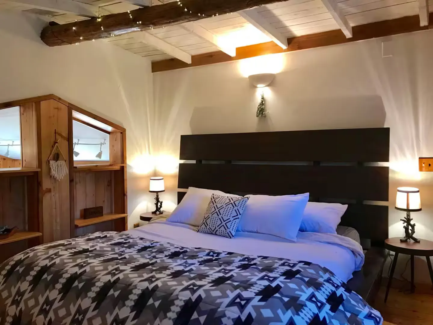 The upstairs king bedroom with vaulted ceiling.