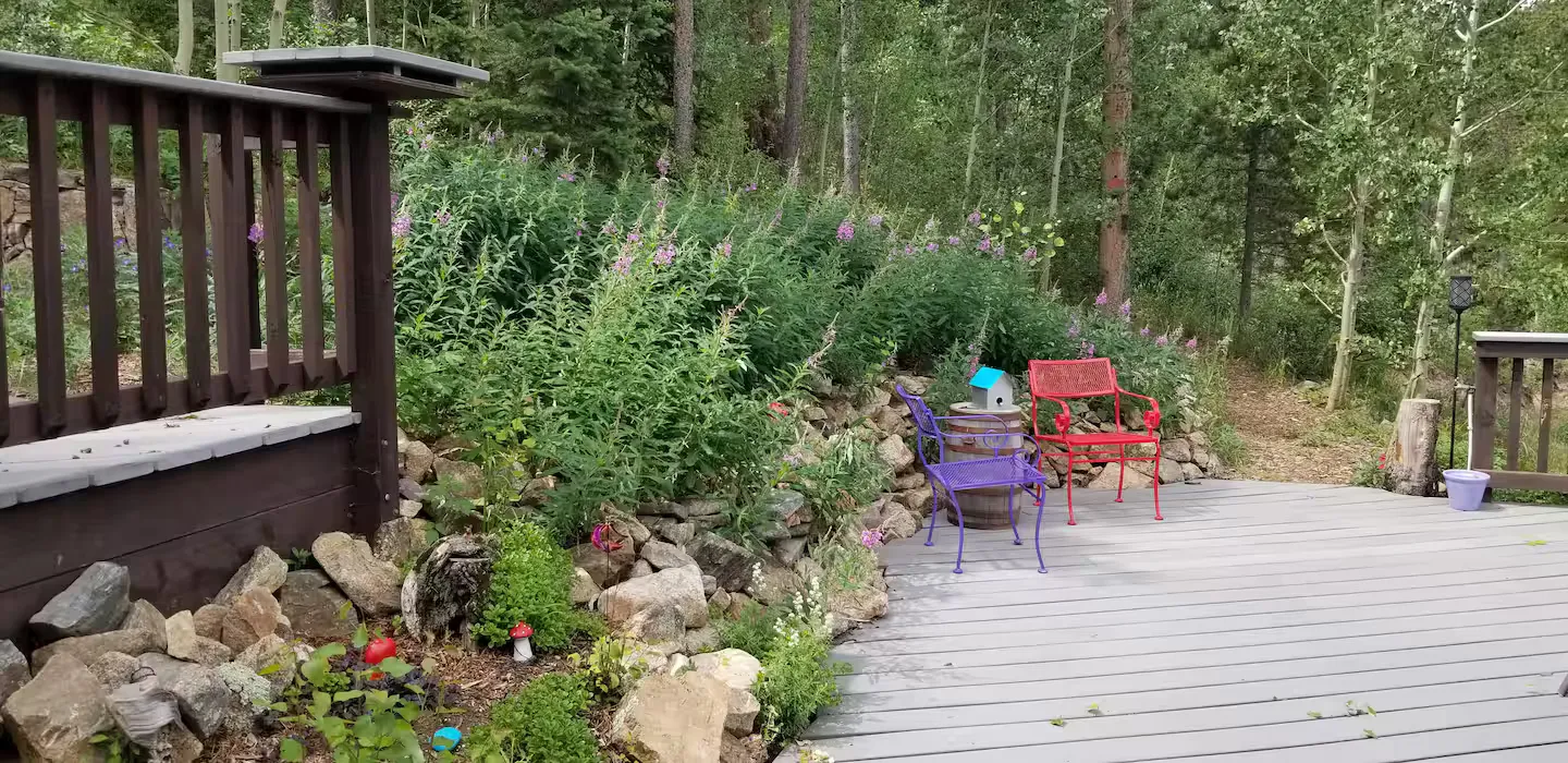 The deck beside the garden beds.