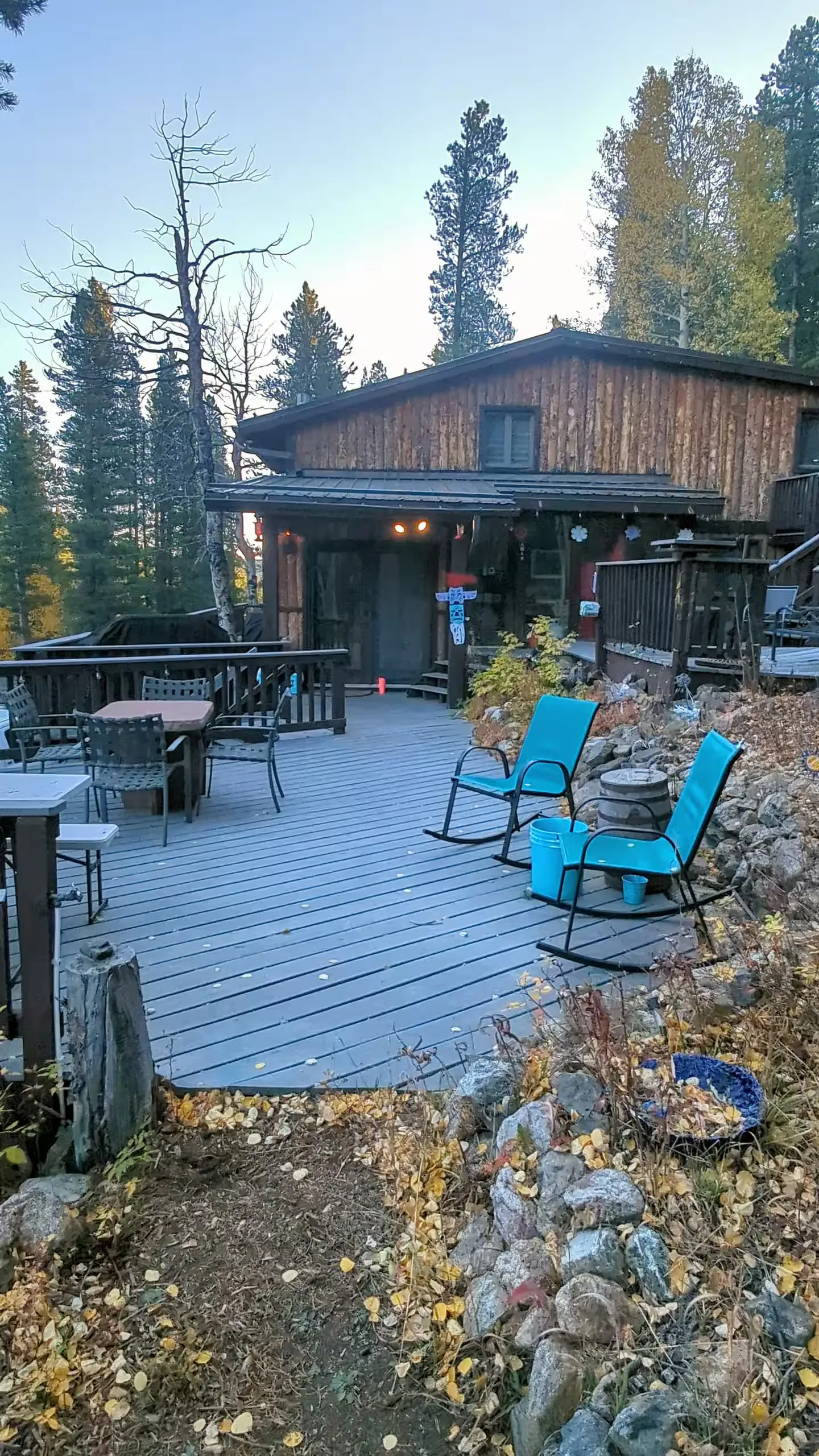 Rocking chairs lined up along the deck.