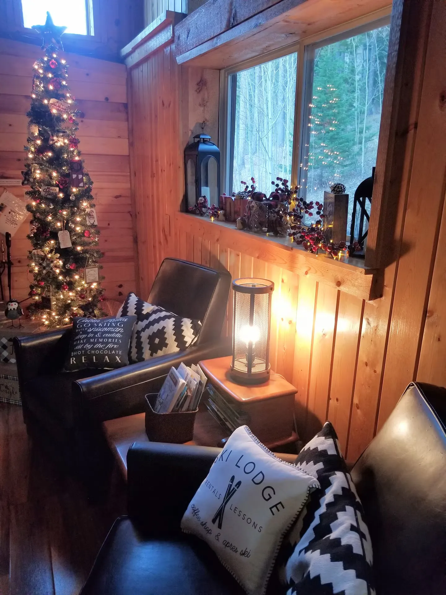 Holiday seating by the windows.